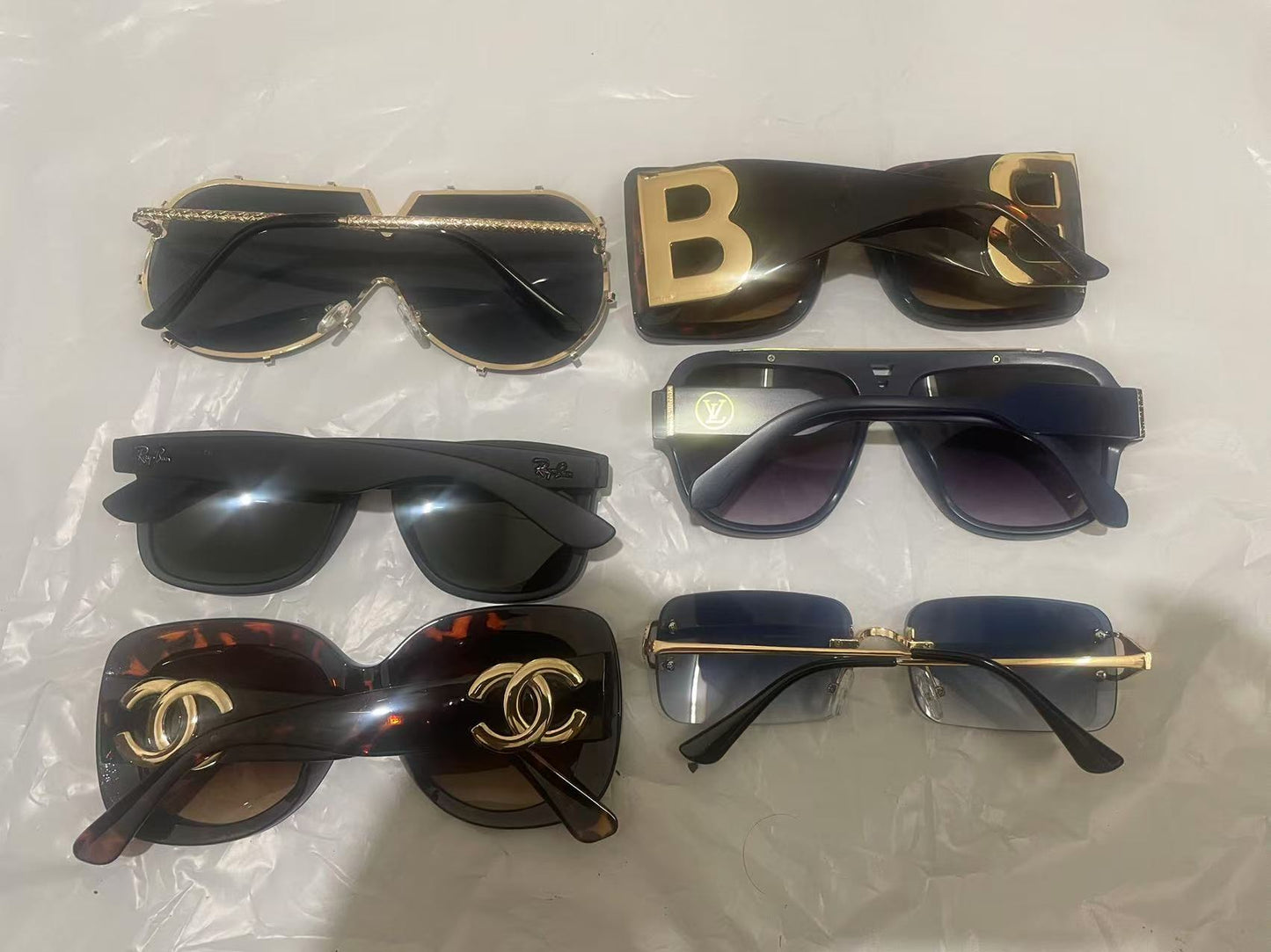 Benefits (2 pairs of sunglasses for $10.) (4 pairs of sunglasses for $18) shipped randomly